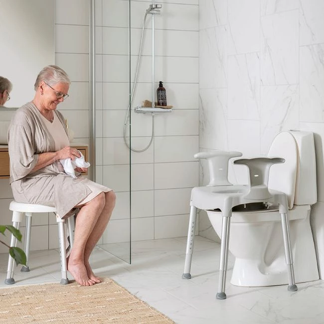 Elevador baño WC regulable en altura con reposabrazos - Benclinic